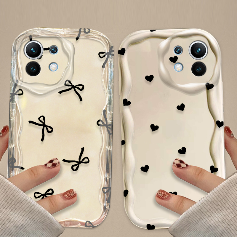Xiaomi Poco X6 - جراب أسود بتصميم فيونكة وقلب لهواتف